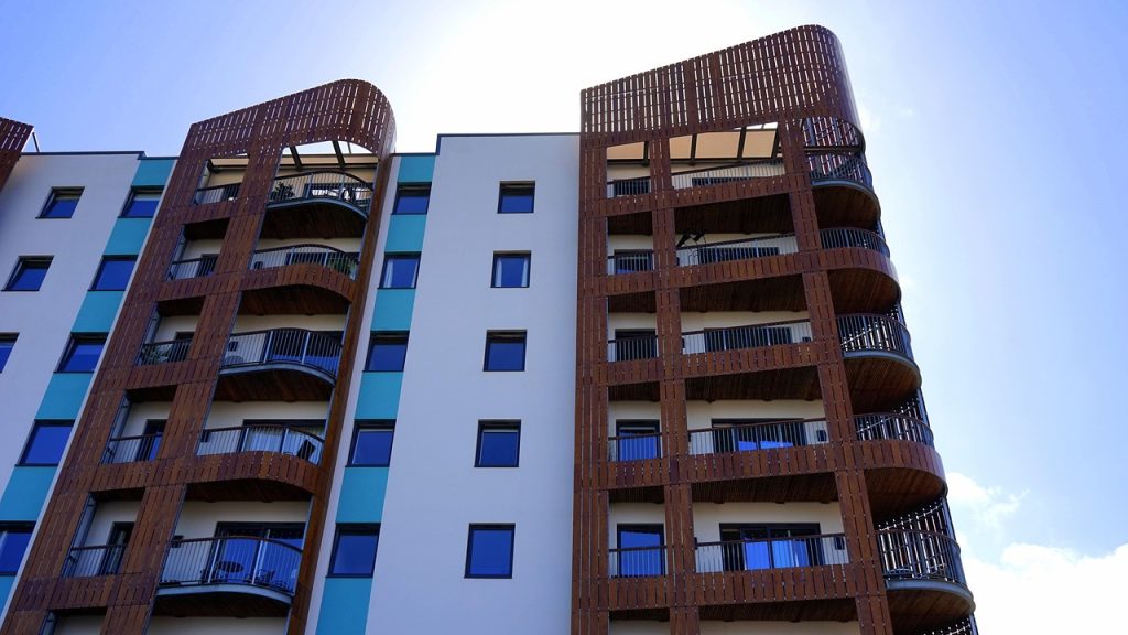 building, sky, architecture, city, skyscraper, modern, cityscape, high, exterior, tower, blue, skyline, sun, modern building, structure, tall, apartment, blue sky, nature, rise, residential, home, window, concrete, housing, estate, development, new, block, downtown, district, design, wall, glass, contemporary, blue home, blue window, blue wall